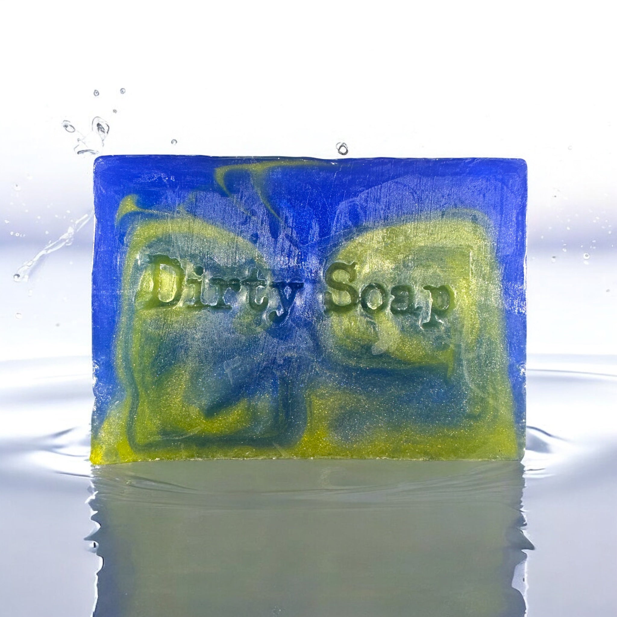 Bar of soap with 'Dirty Soap' text in blue and yellow on a water surface
