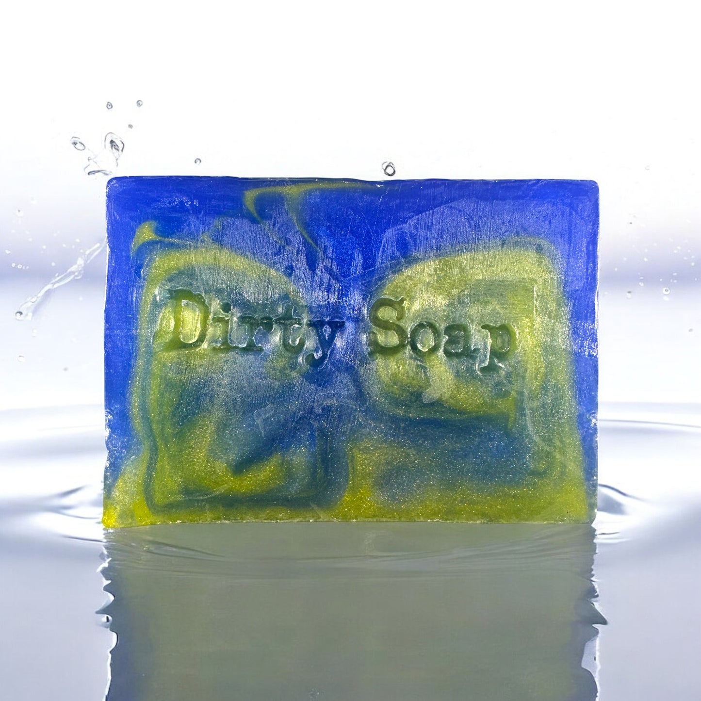 Bar of soap with 'Dirty Soap' text in blue and yellow on a water surface