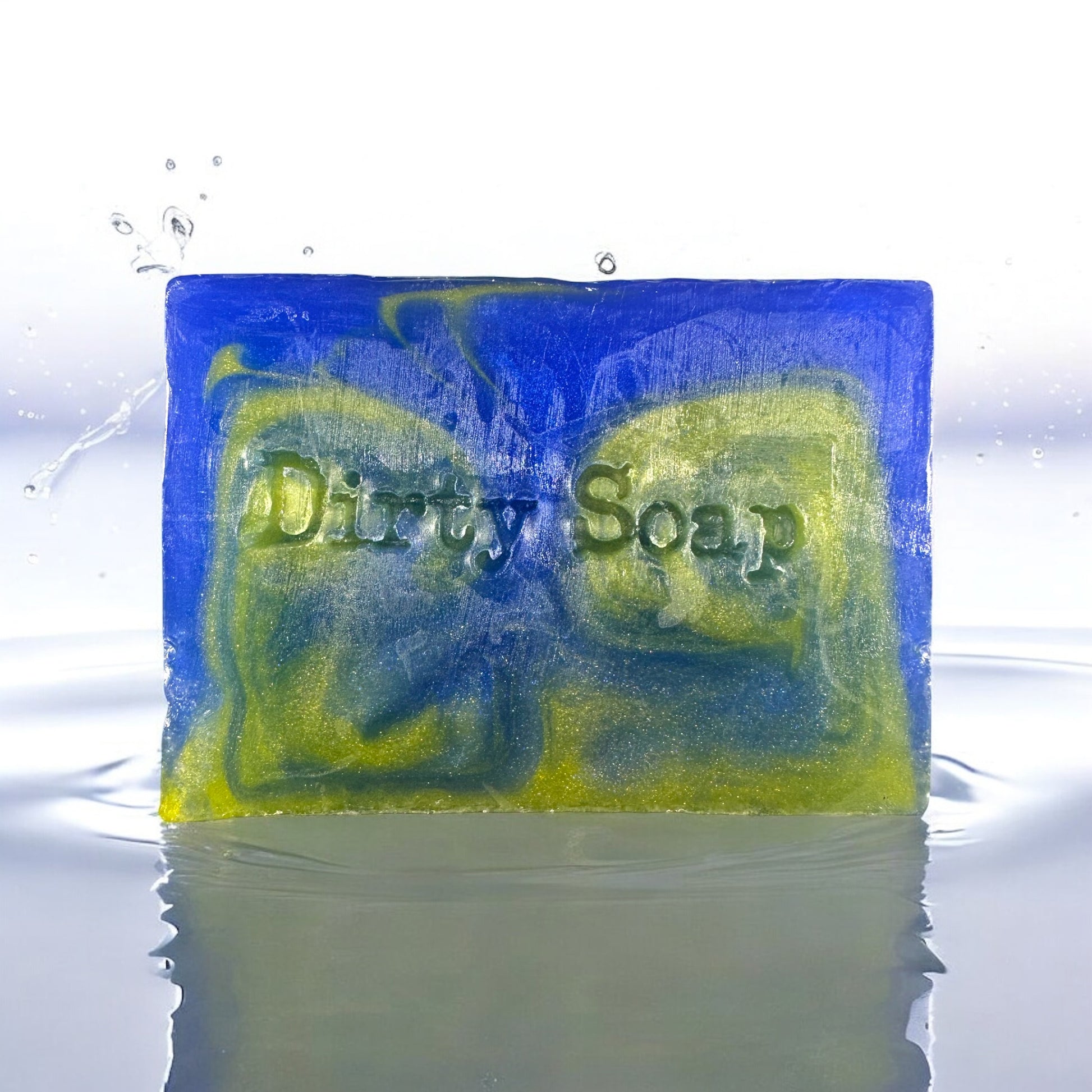 Bar of soap with 'Dirty Soap' text in blue and yellow on a water surface